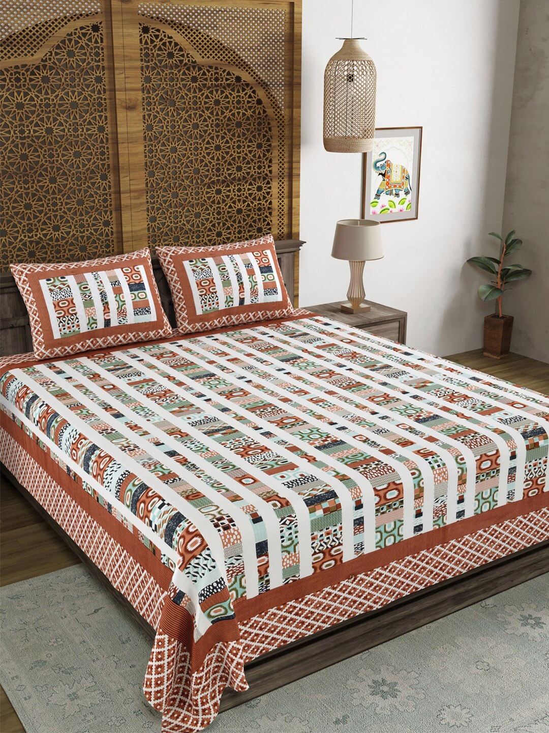 

Aura Red Ethnic Motifs Cotton 120 TC King Bedsheet With 2 Pillow Covers