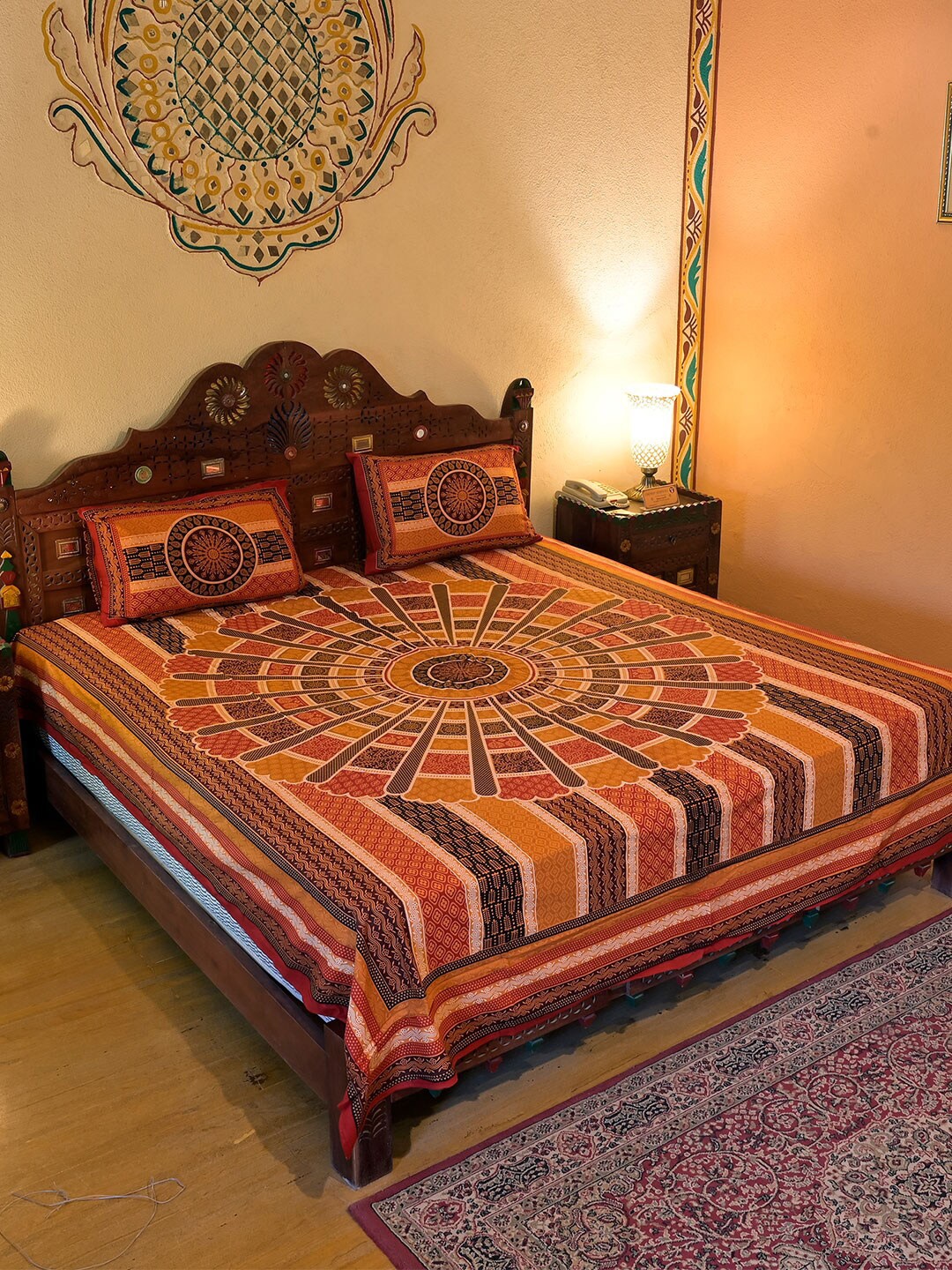 

Chokhi Dhani Kalagram Red & Yellow Ethnic Motifs Queen Bedsheet with 2 Pillow Covers