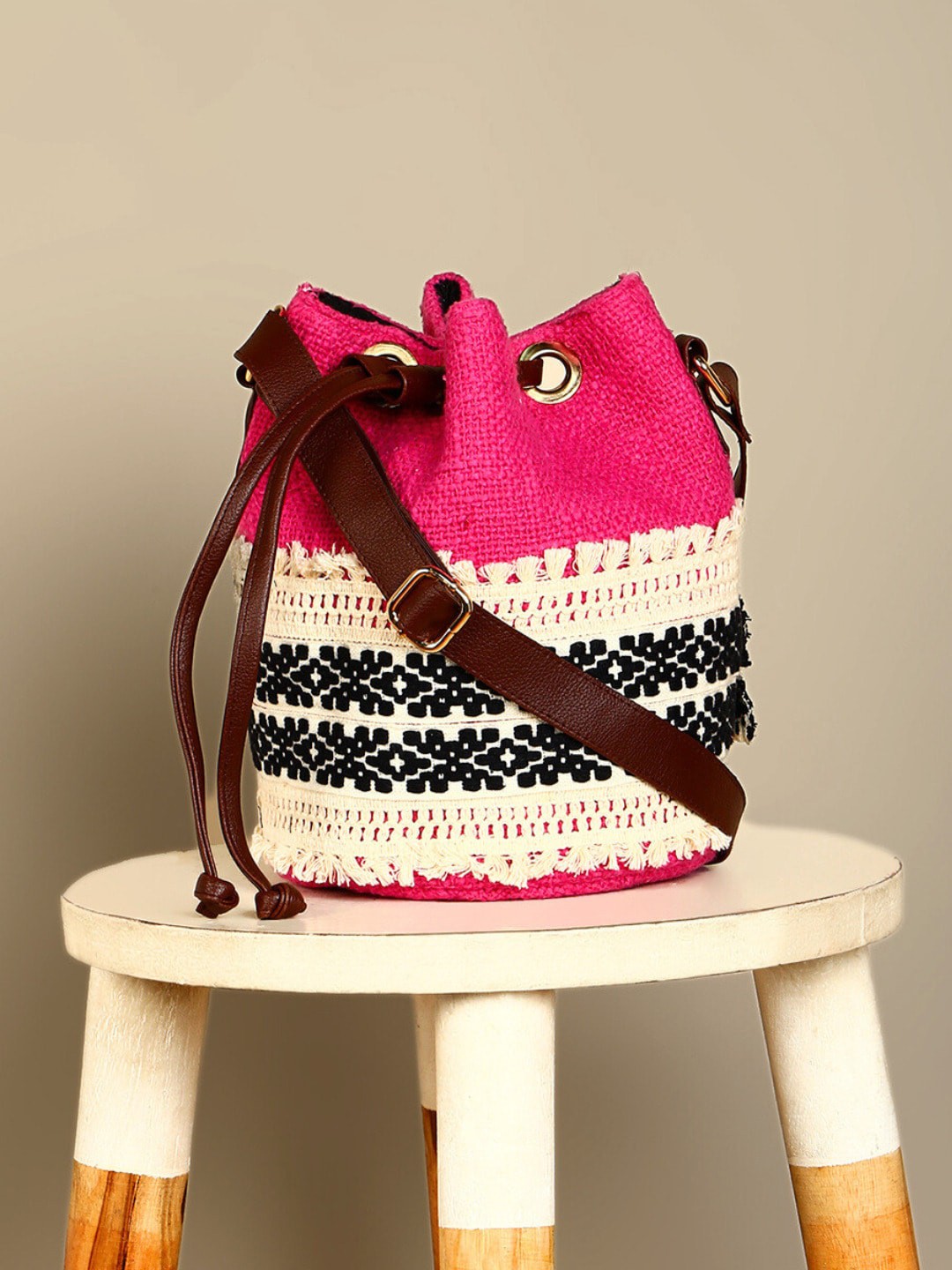 

DEEBACO Ethnic Motifs Self Design Potli Sling Bag, Magenta