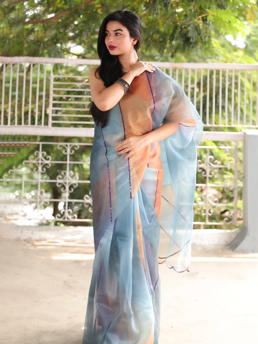 

VEECHIS Blue Sequinned Organza Saree
