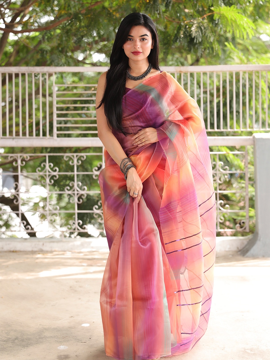 

VEECHIS Purple Sequinned Organza Saree