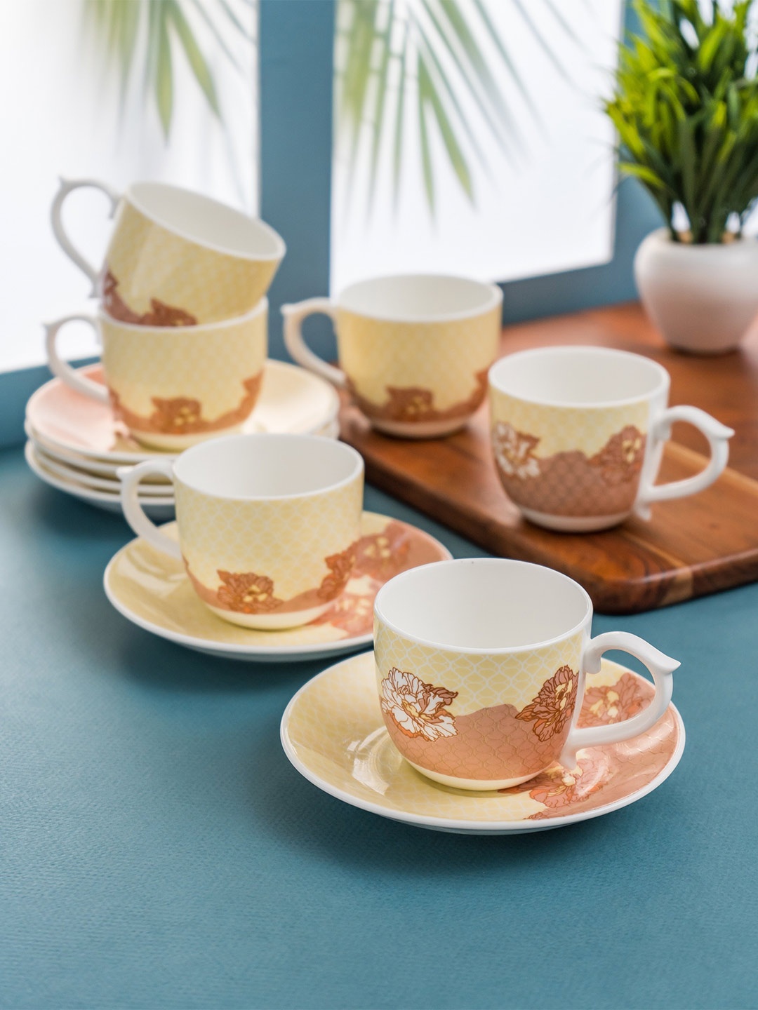 

CLAY CRAFT White & Yellow 12 Pieces Printed Ceramic Glossy Cups & Saucers 180 ml Each