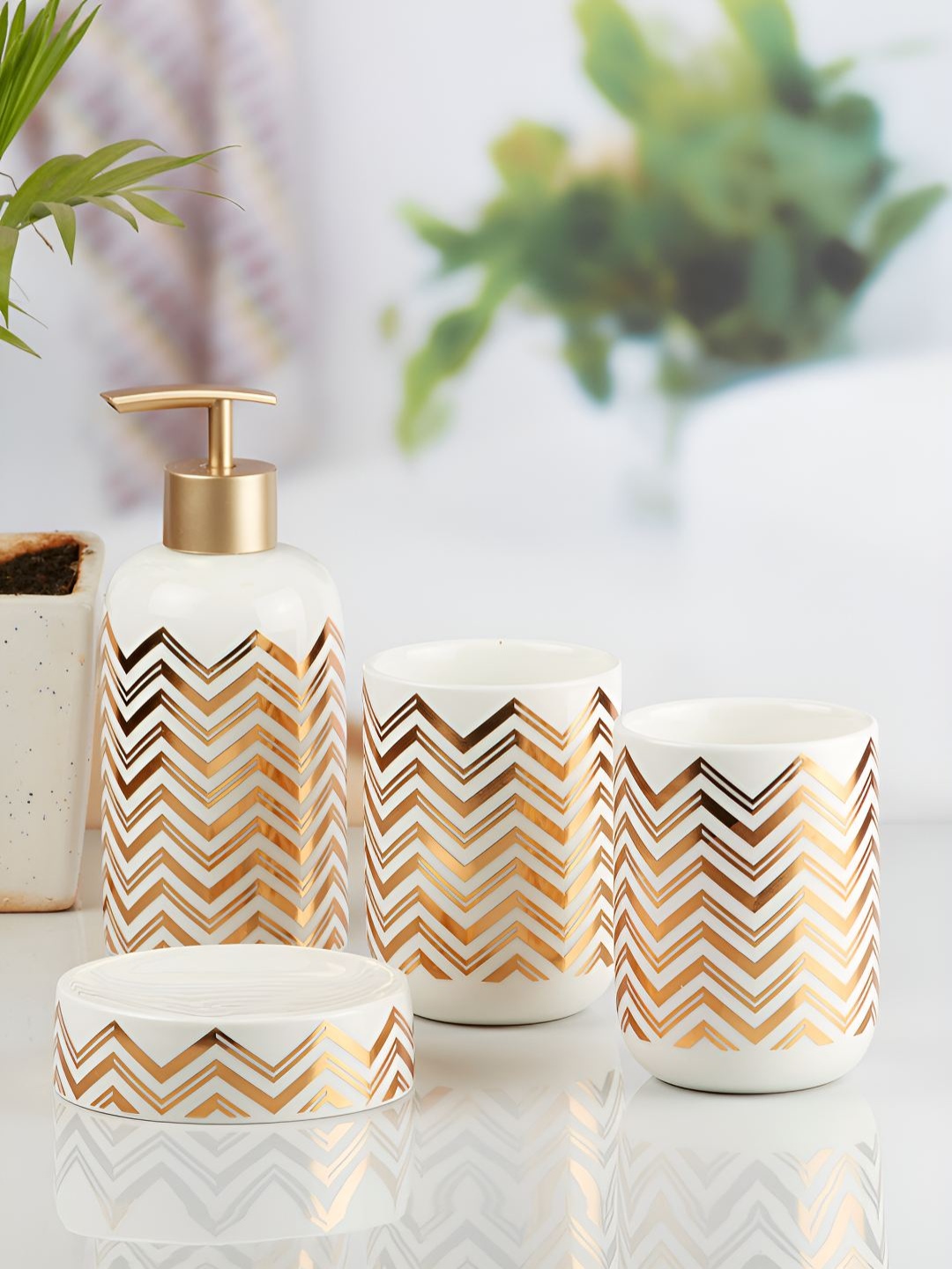 

Kookee White & Gold Toned 4 Pcs Abstract Ceramic Bath Accessories