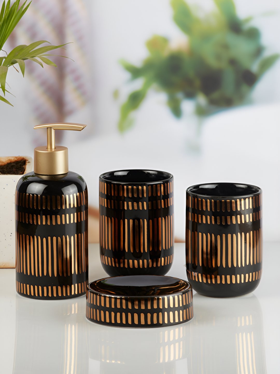 

Kookee Black & Gold Toned 4 Pcs Striped Ceramic Bath Accessories