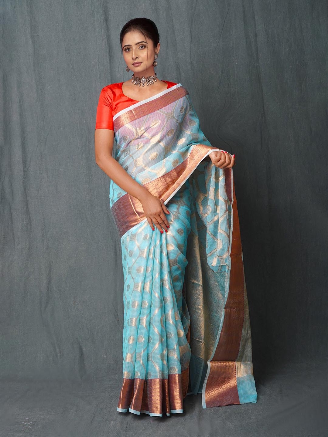 

Unnati Silks Ethnic Motifs Woven Design Zari Kota Saree, Blue