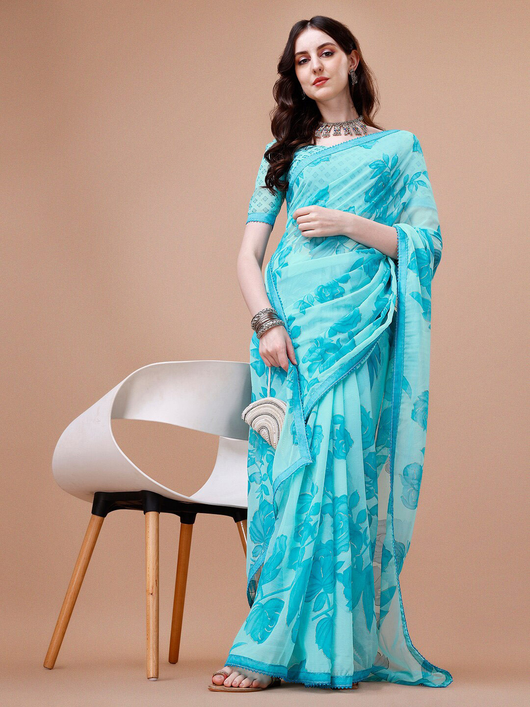 

Sangria Turquoise Blue Floral Printed Pure Chiffon Saree