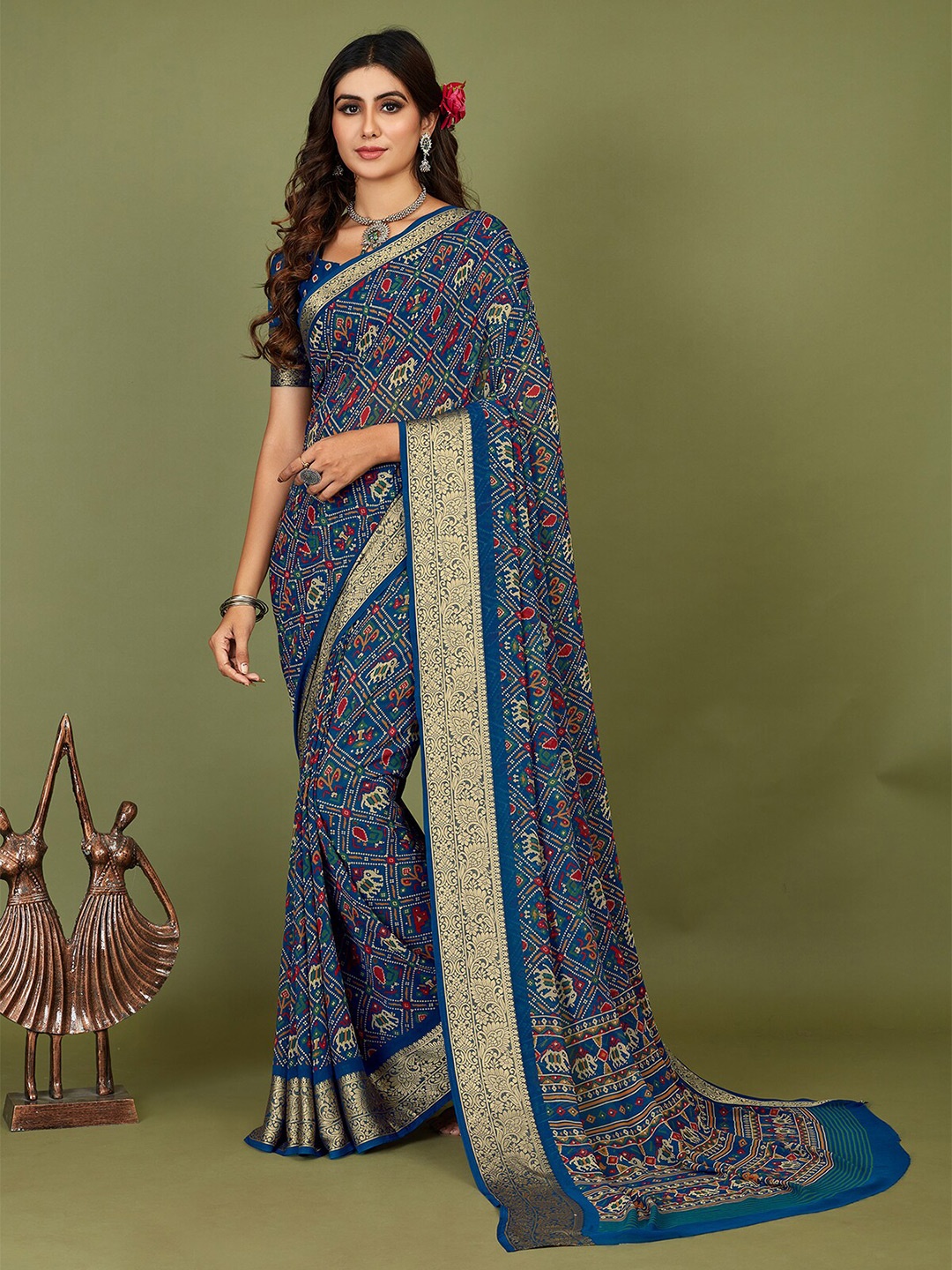 

Mitera Blue Ethnic Motifs Printed Silk Cotton Patola Saree