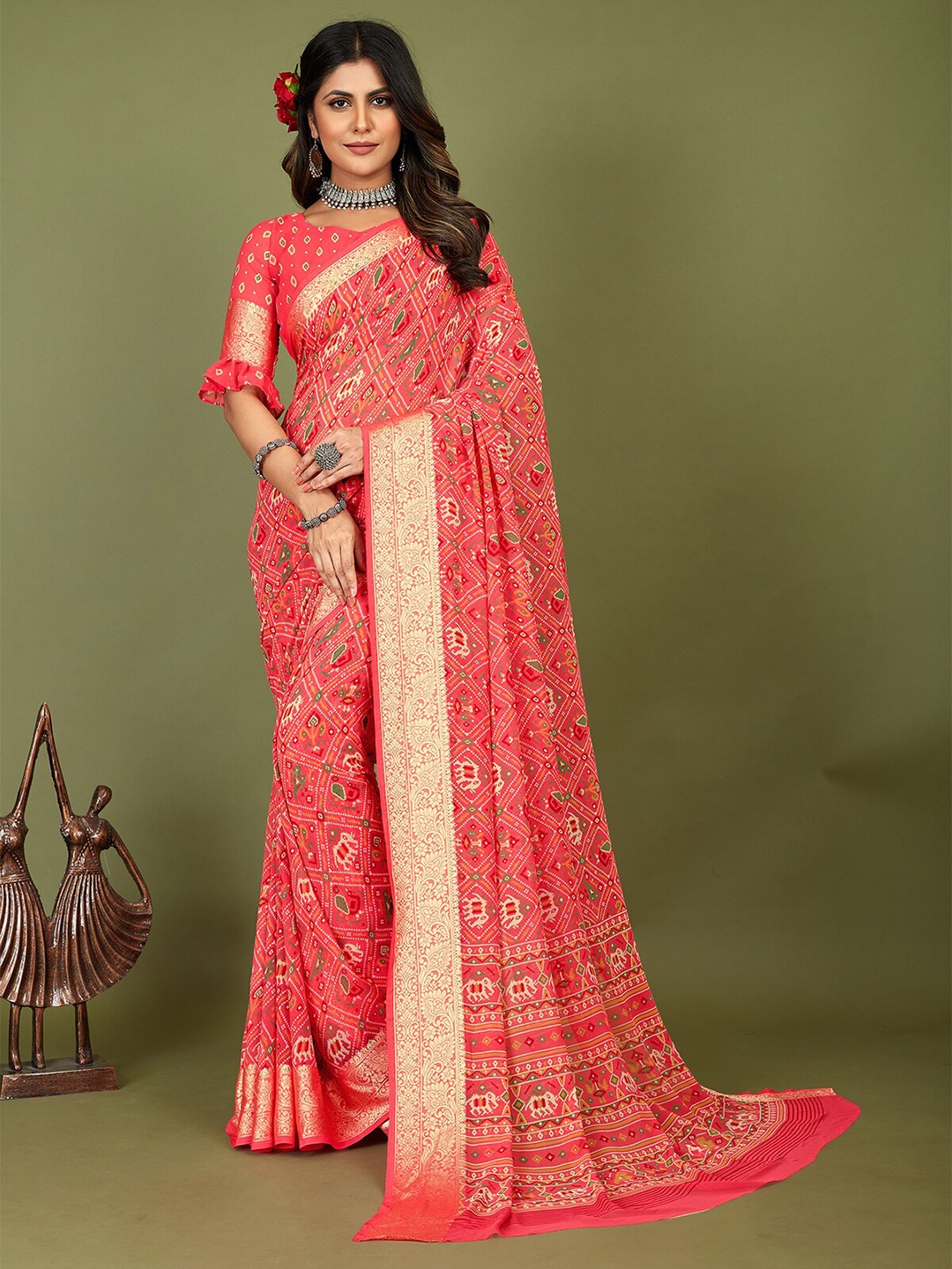 

Mitera Peach-Coloured Ethnic Motifs Printed Silk Cotton Patola Saree