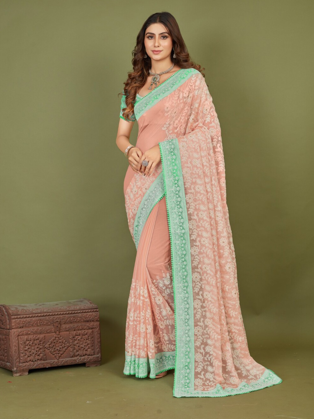 

Mitera Peach Coloured Floral Embroidered Saree