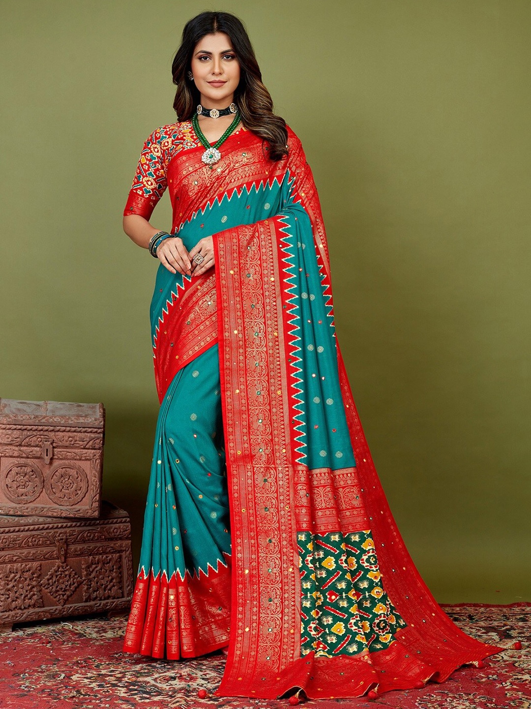 

Mitera Teal Geometric Printed Silk Cotton Saree