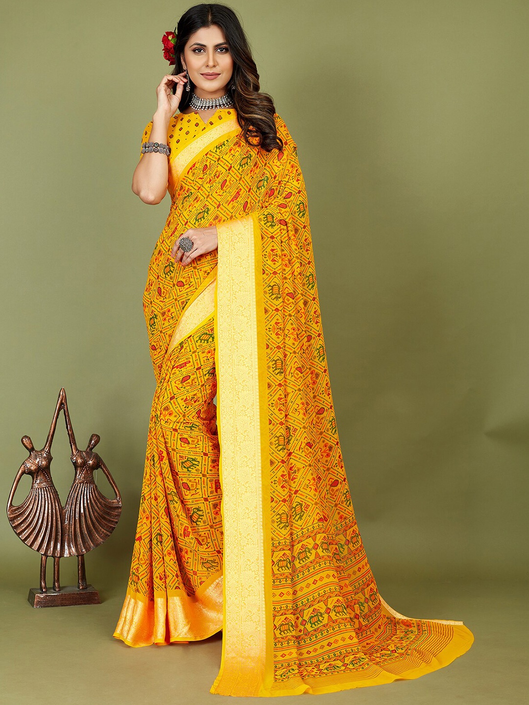 

Mitera Yellow & Red Ethnic Motifs Printed Silk Cotton Patola Saree