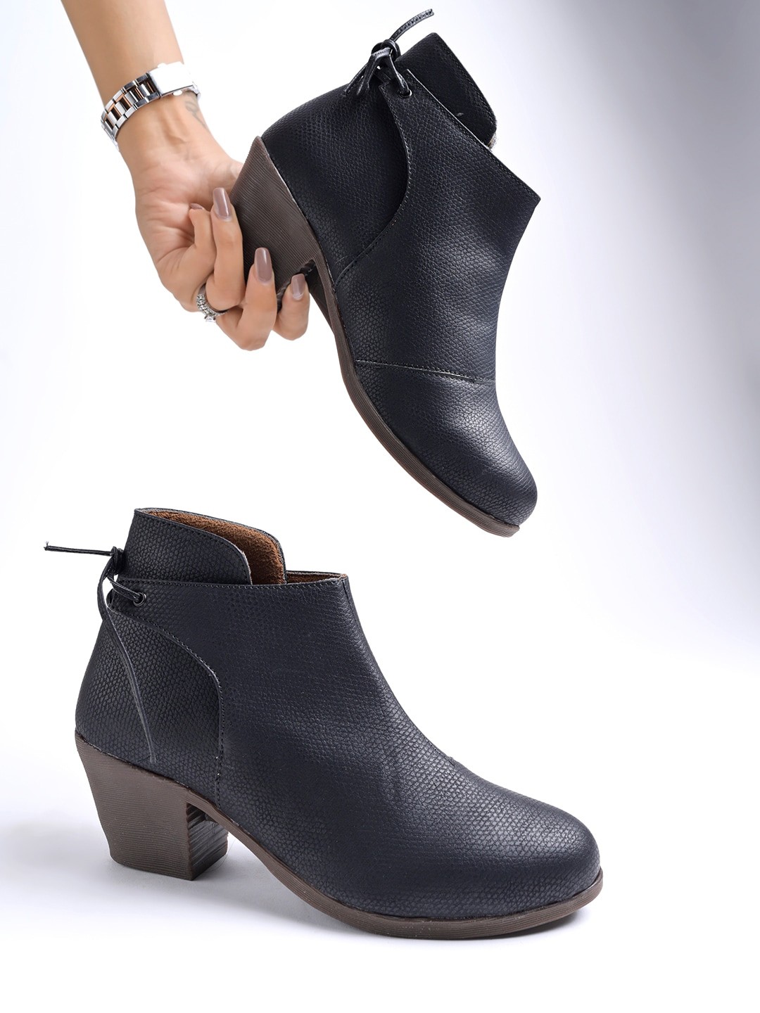 

Stylestry Women Textured Heeled Mid-Top Regular Boots, Black