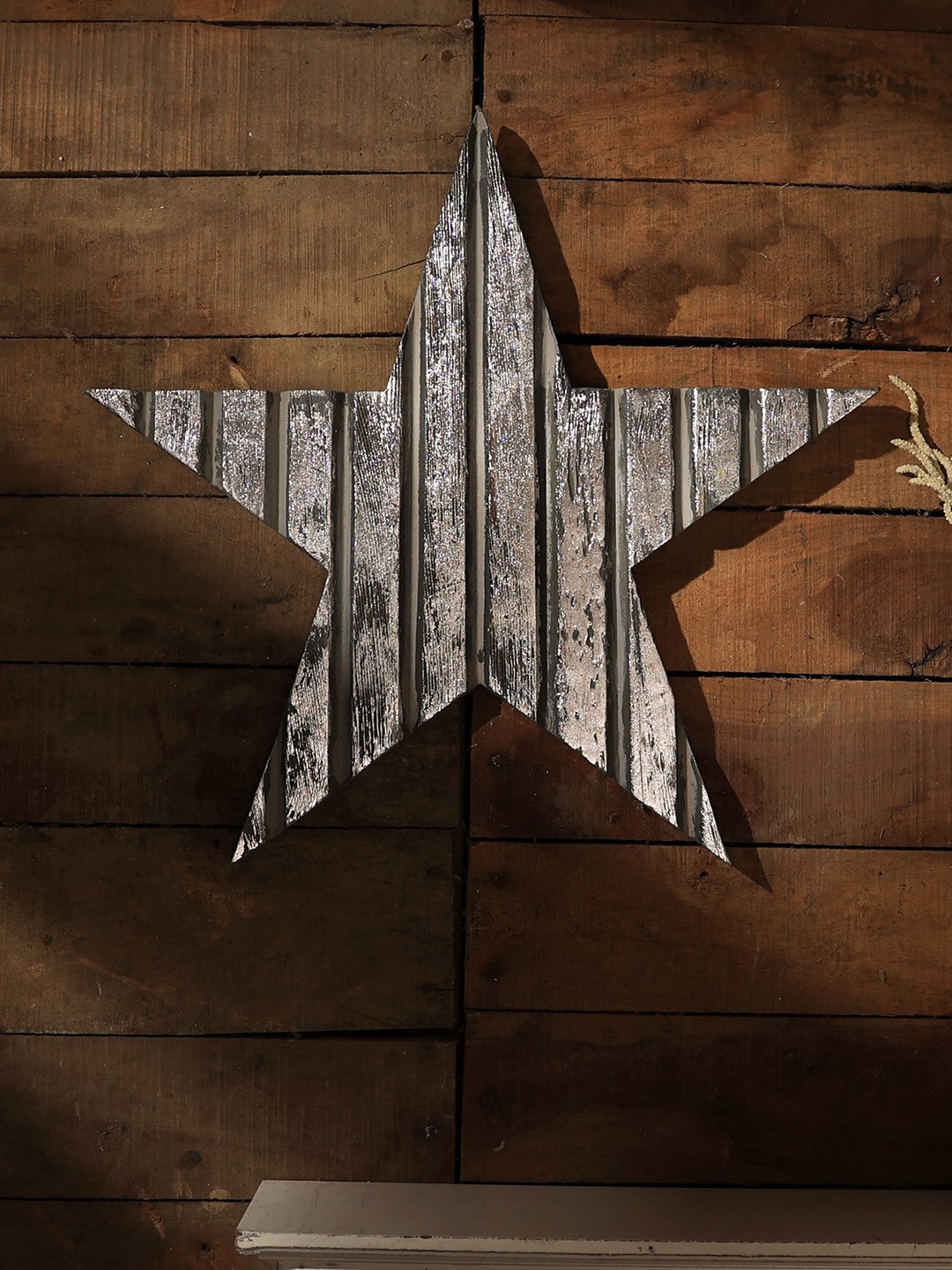 

Designer Library Grey Star Carved Wooden Wall Hanging