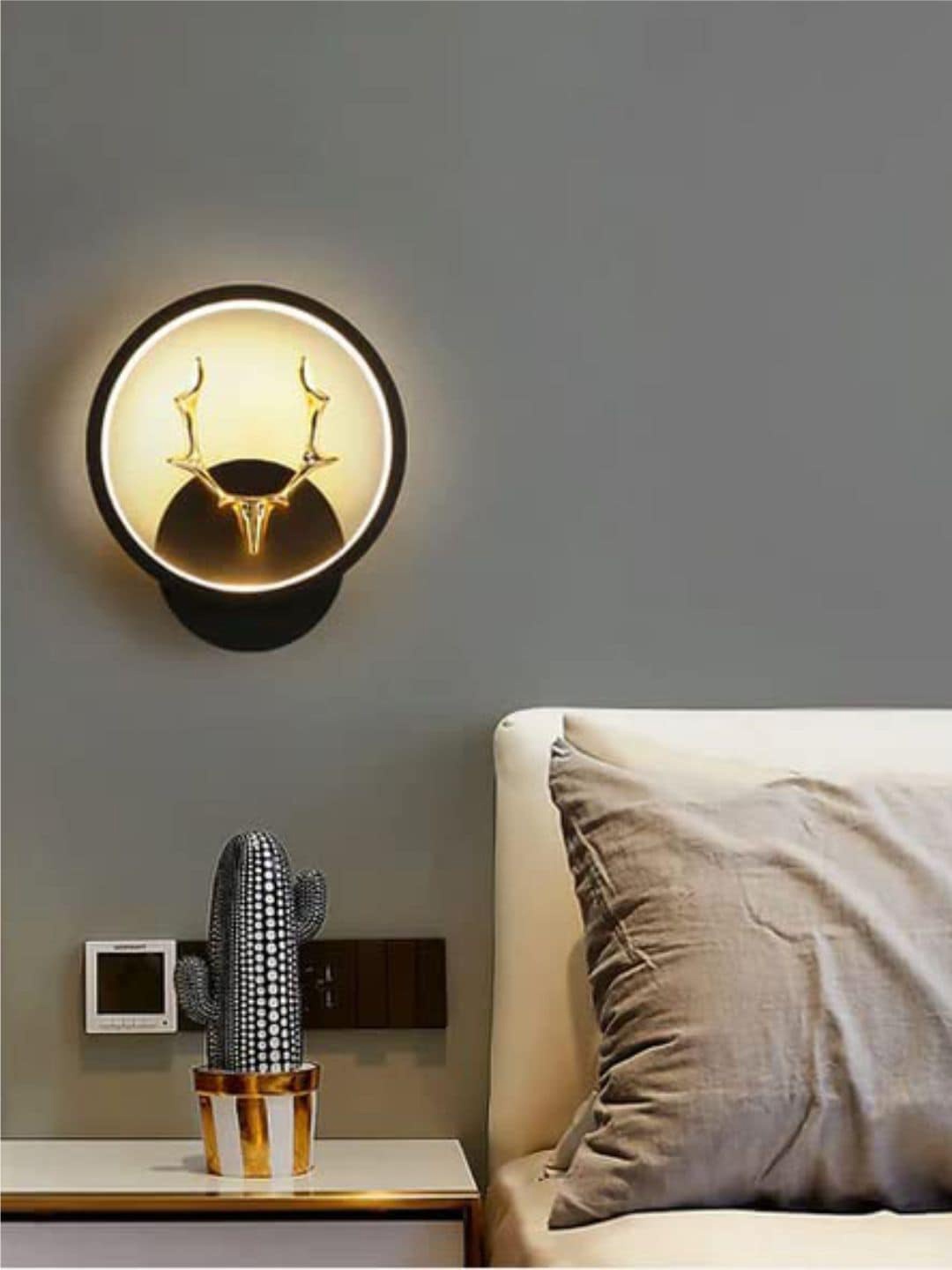 

The Art House Black LED Stag Round Wall Lamp