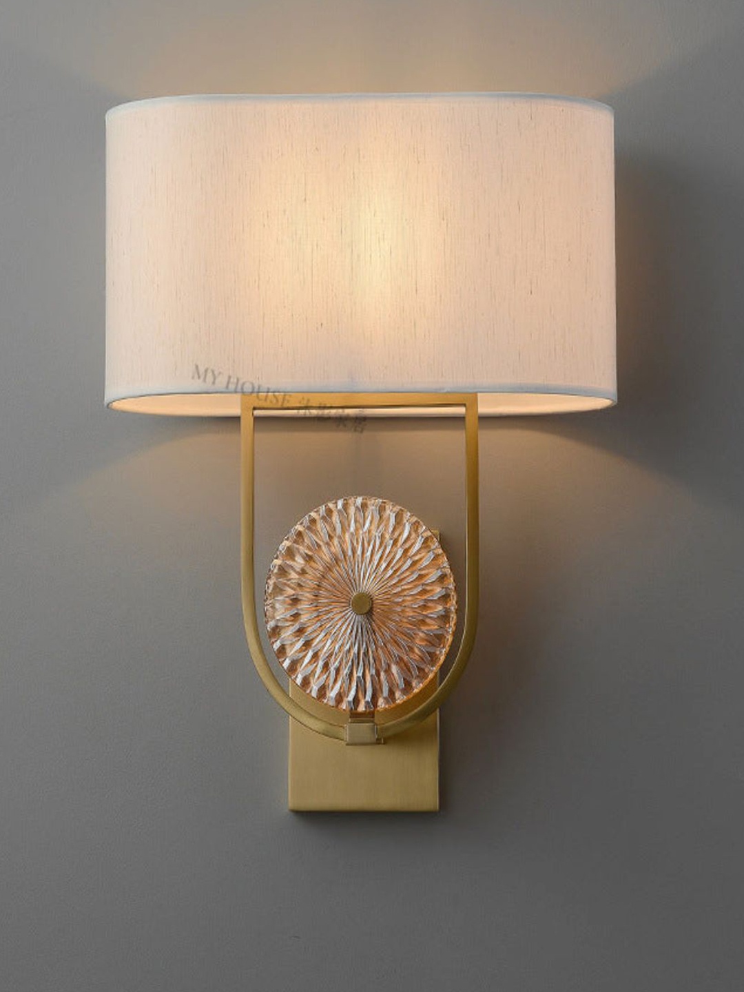 

The Art House Gold Toned Bedside Cylindrical Wall Lamp