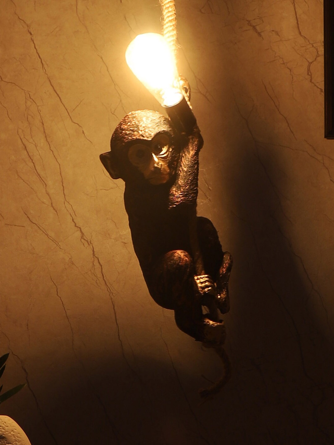 

MFD HOME FURNISHING Metallic Toned & Black Ceramic Monkey Ceiling Lamp