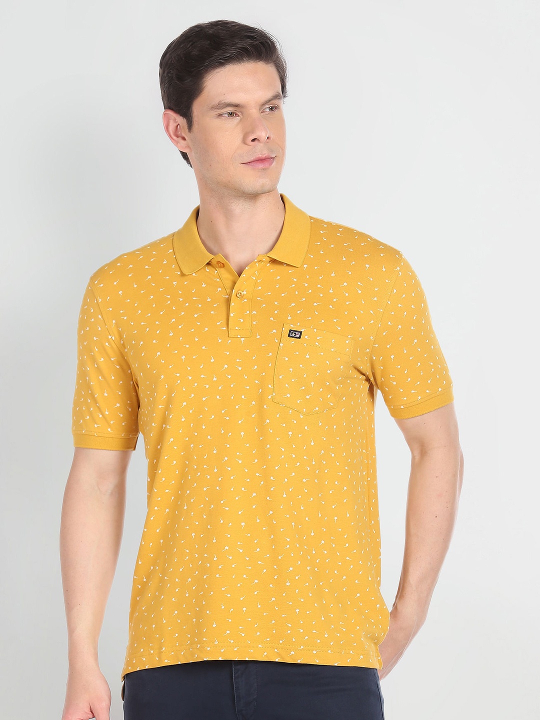 

Arrow Sport Conversational Printed Polo Collar Pure Cotton T-shirt, Mustard