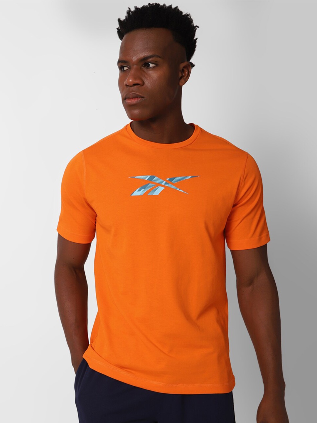

Reebok Brand Logo Printed Train Speedwick Gfx Slim-Fit T-Shirt, Orange