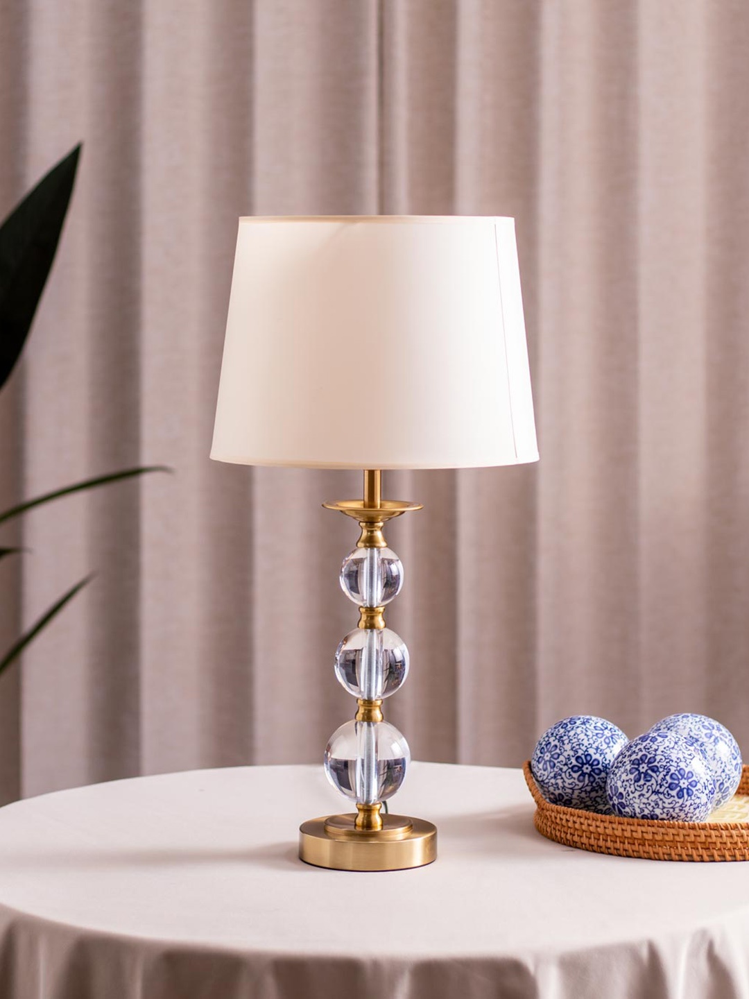 

THEDECORKART White Metal Frustum Shaped Table Lamp, Gold