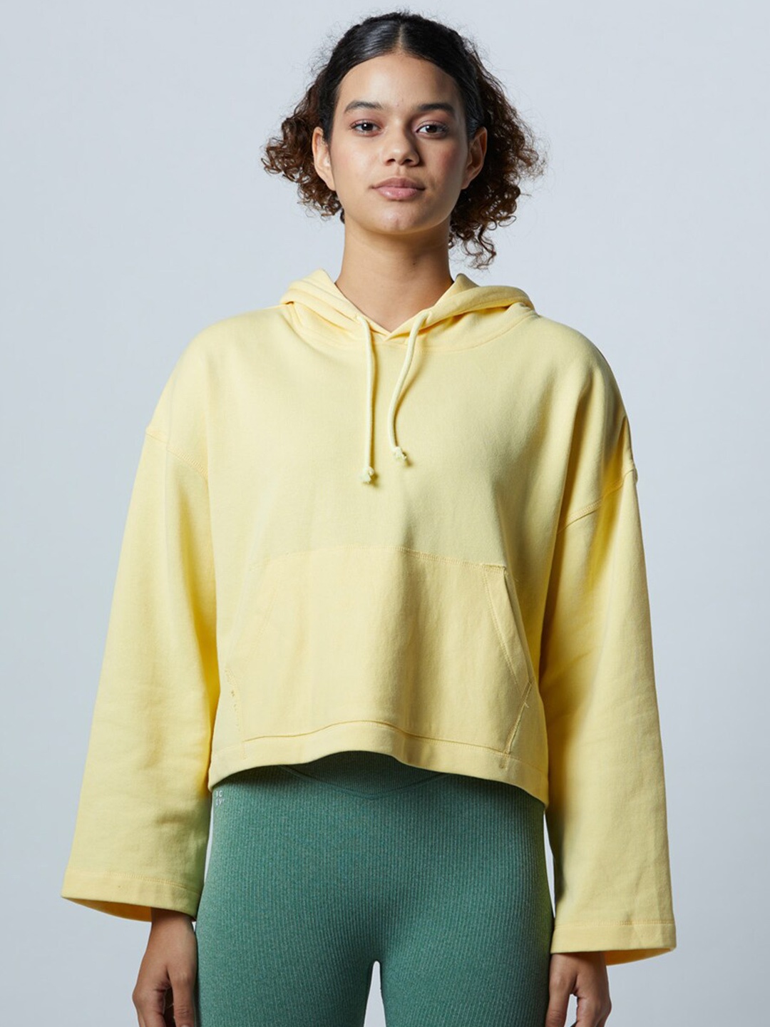 

Koovs Long Sleeves Pure Cotton Hood Oversized Crop Pullover Sweatshirt, Yellow