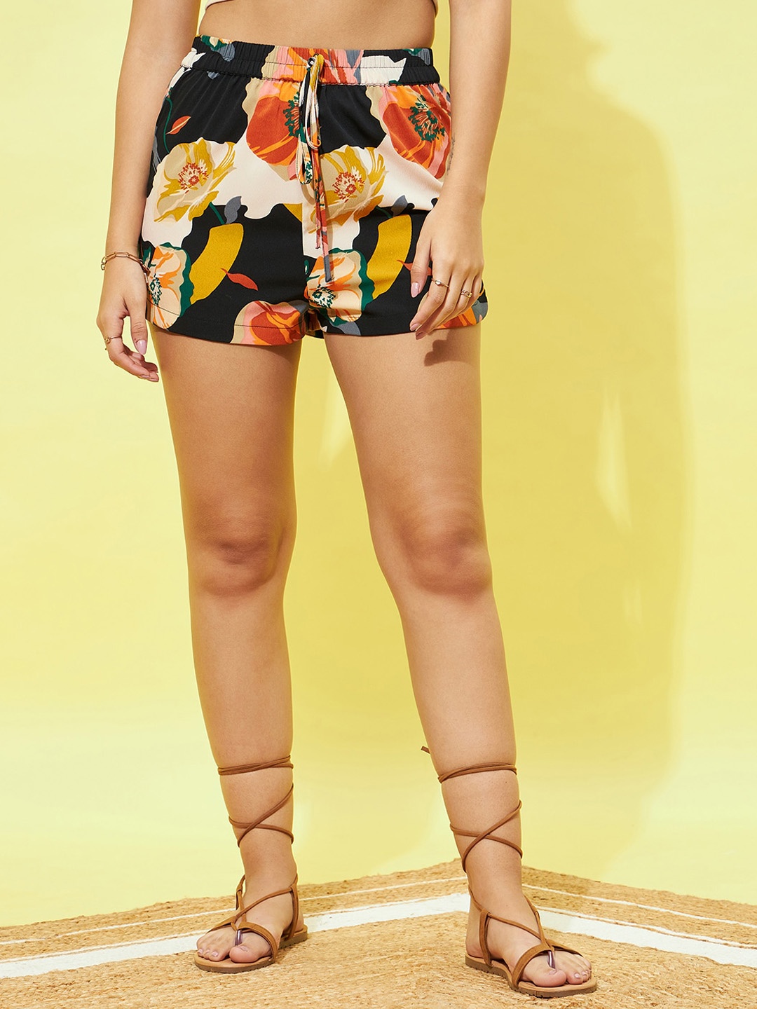 

Berrylush Women Black & Yellow Floral Printed High-Rise Shorts