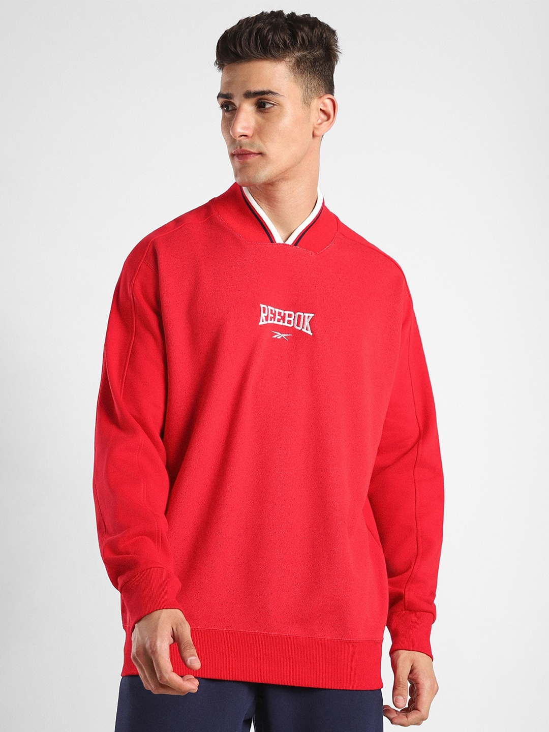 

Reebok Embroidered Cl Var Ft Crew Mock Collar Pullover Sweatshirt, Red