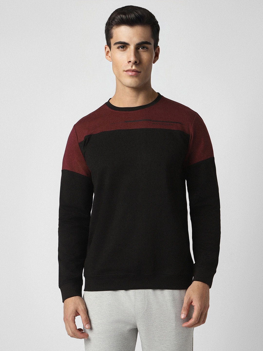 

Van Heusen Flex Men Black Colourblocked Sweatshirt