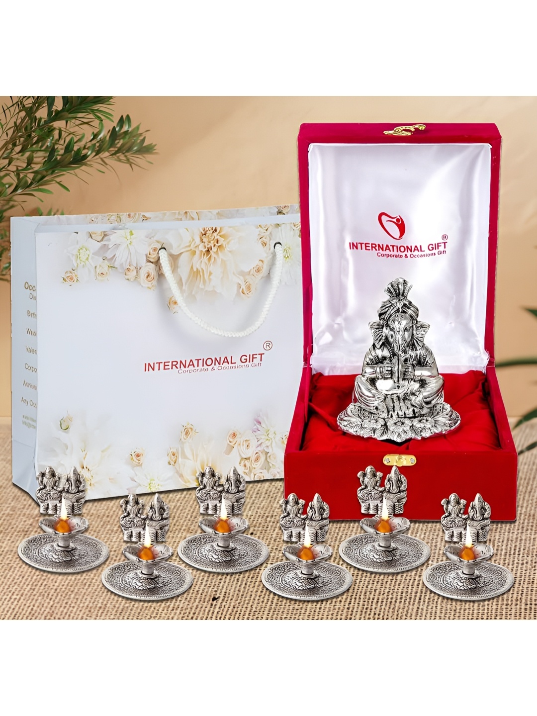 

INTERNATIONAL GIFT Silver 7 Pieces Ganesh Idol With Laxmi Ganesh Diya Gift Sets