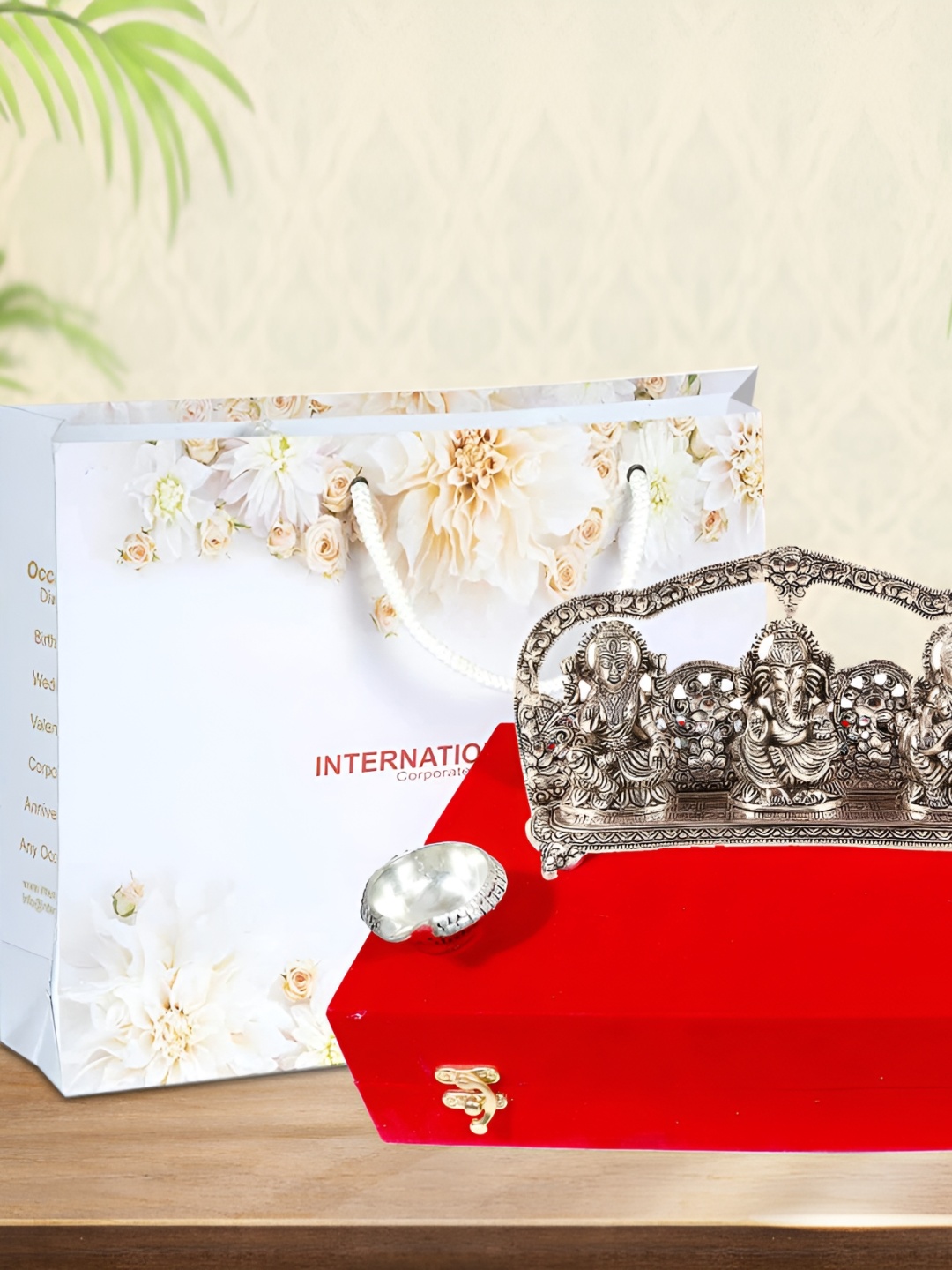 

INTERNATIONAL GIFT Silver Toned & Grey Laxmi Ganesh Sarswati With Diya Gift Set