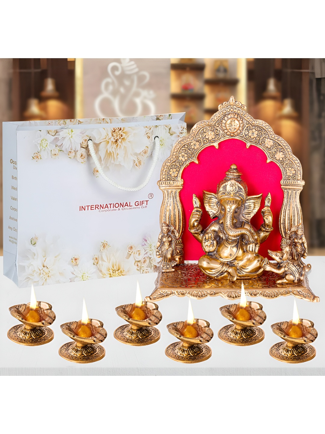 

INTERNATIONAL GIFT Brown & Red Ganesh God Idol Statue With Hand Diya Gift Sets