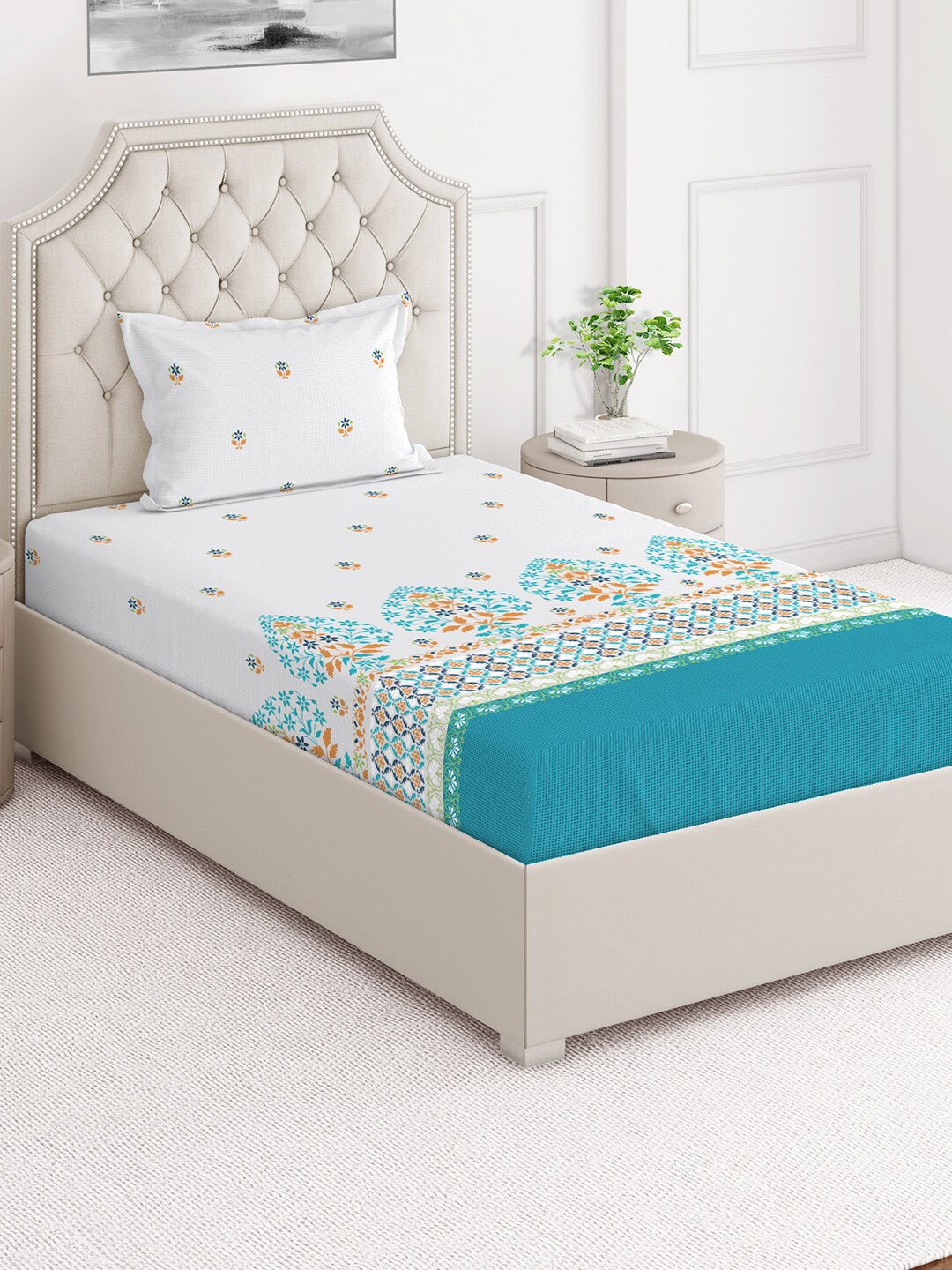 

Layers Duracount White & Blue Floral 220 TC Single Bedsheet with Pillow Cover