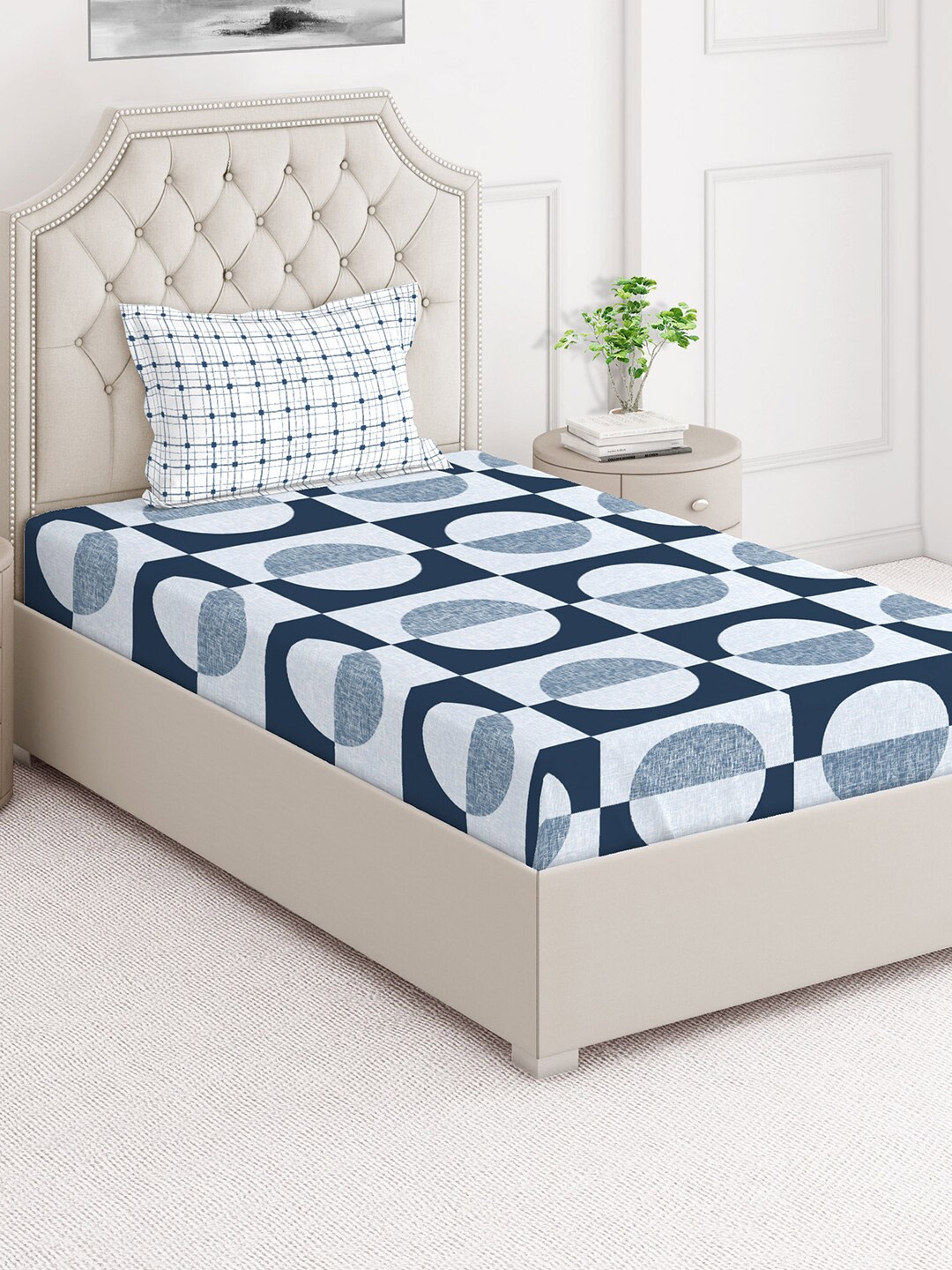 

Layers Illuminating Homes Blue & White Geometric 152 TC Single Bedsheet with Pillow Cover