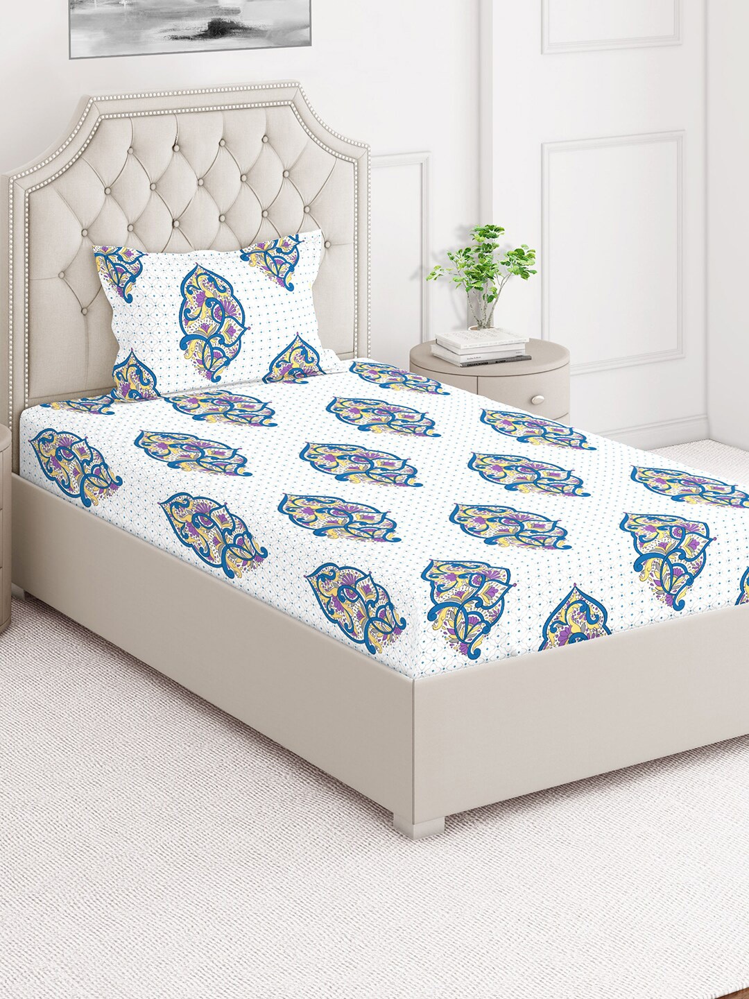 

Layers Duracount White & Blue Ethnic Motifs 220 TC Single Bedsheet with Pillow Cover