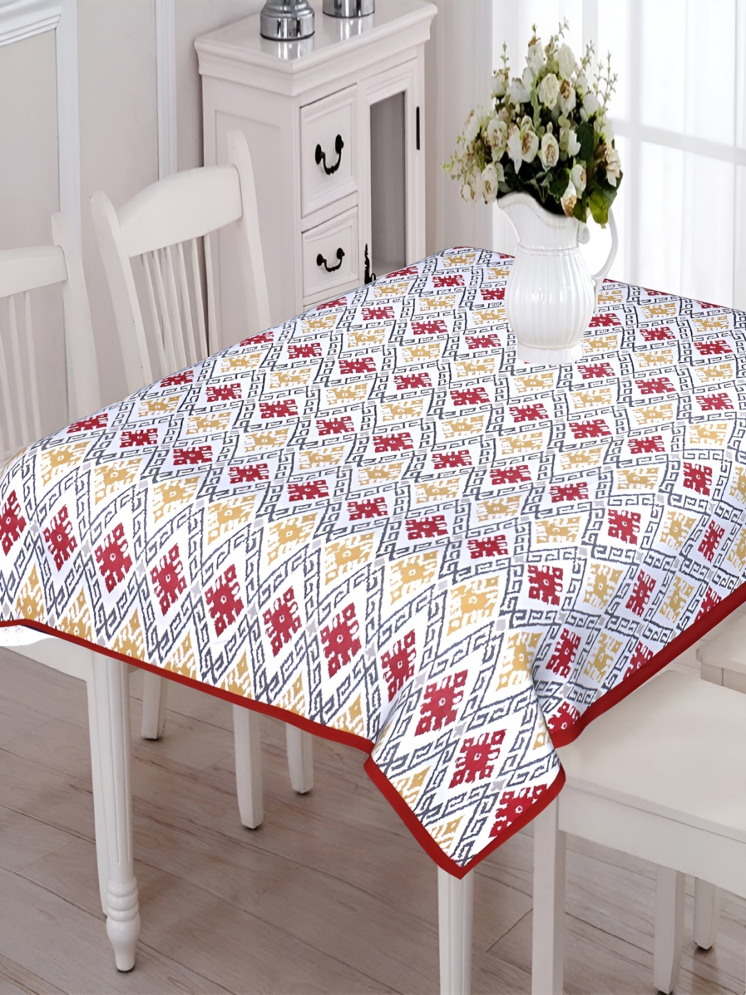 

Texstylers Red & White Ethnic Motifs Anti-Slip Cotton 6-Seater Rectangular Table Cover