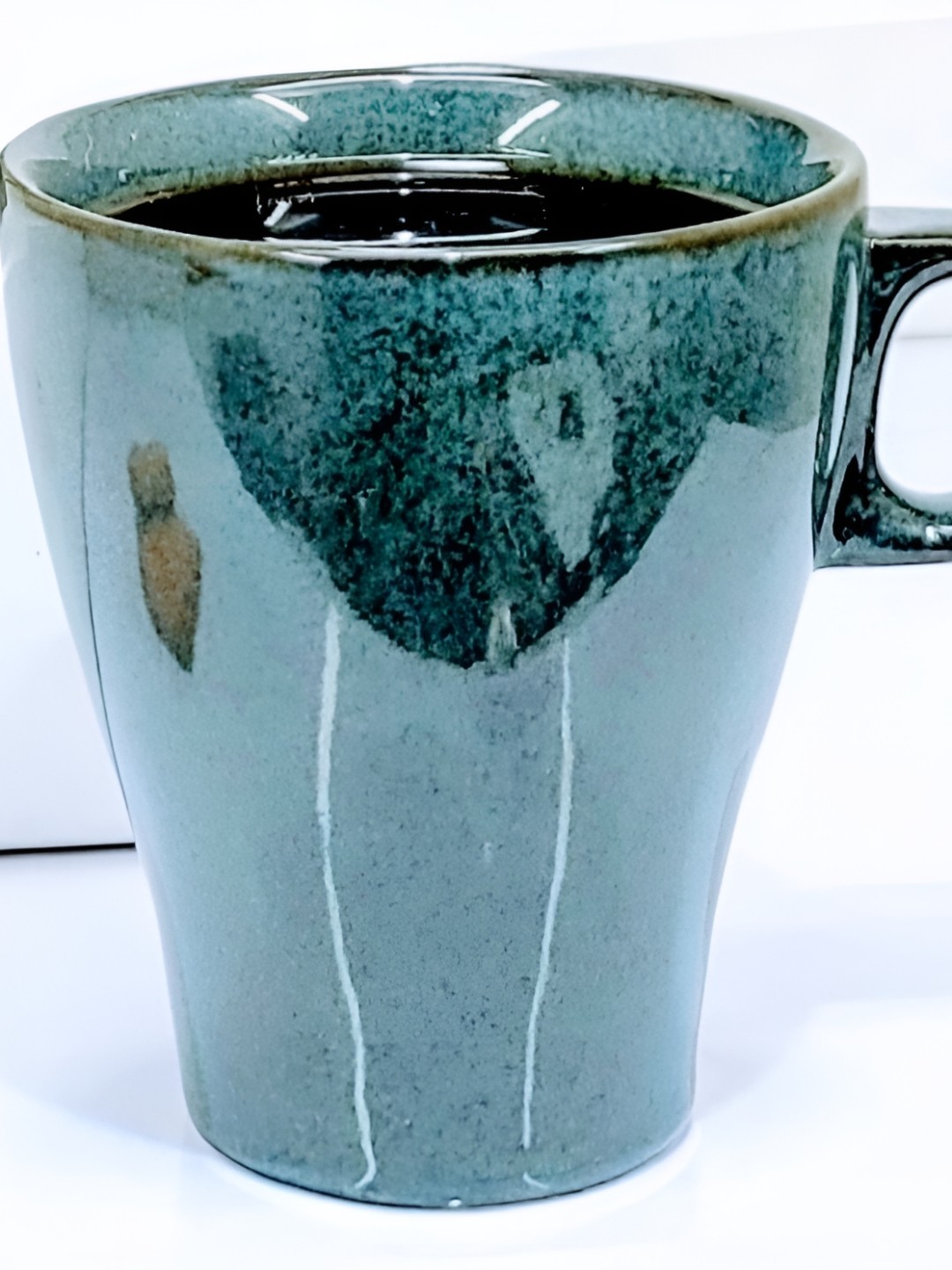 

Kittens Blue & Green Textured Ceramic Glossy Mug 240ml