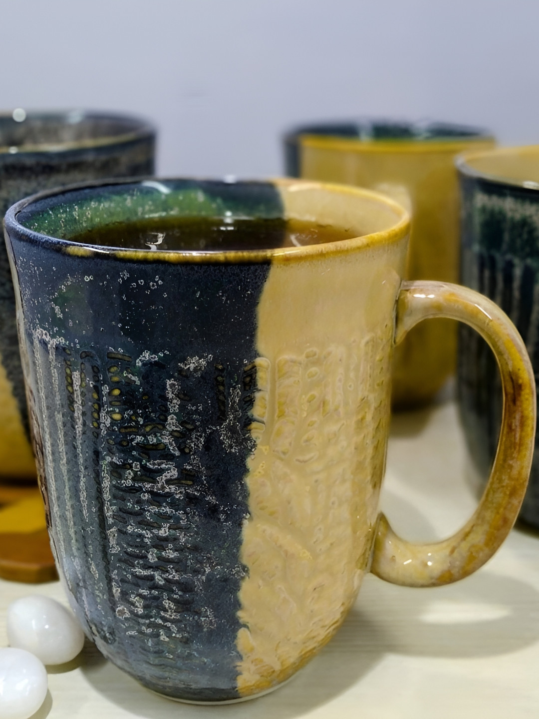 

Kittens Blue & Yellow 4 Pieces Textured Ceramic Glossy Mugs 375ml