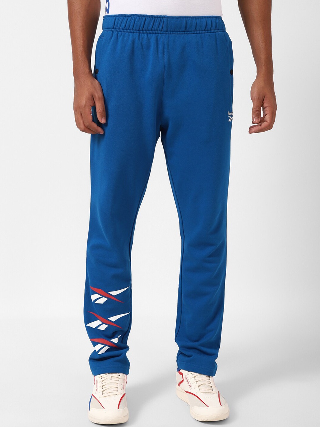 

Reebok Men Wce Printed Pure Cotton Track Pants, Blue