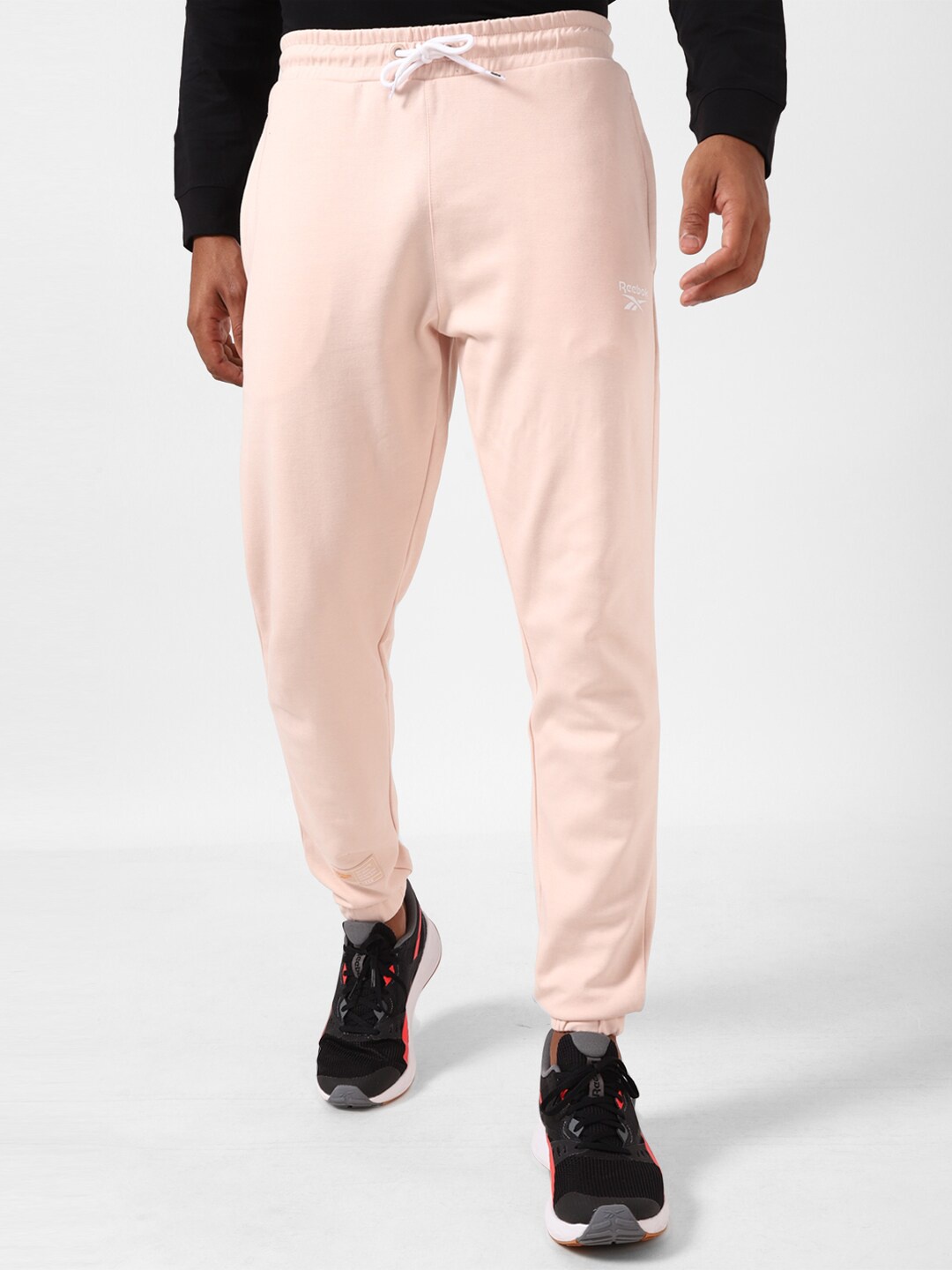 

Reebok Men Mid-Rise Yg Dc Joggers, Pink