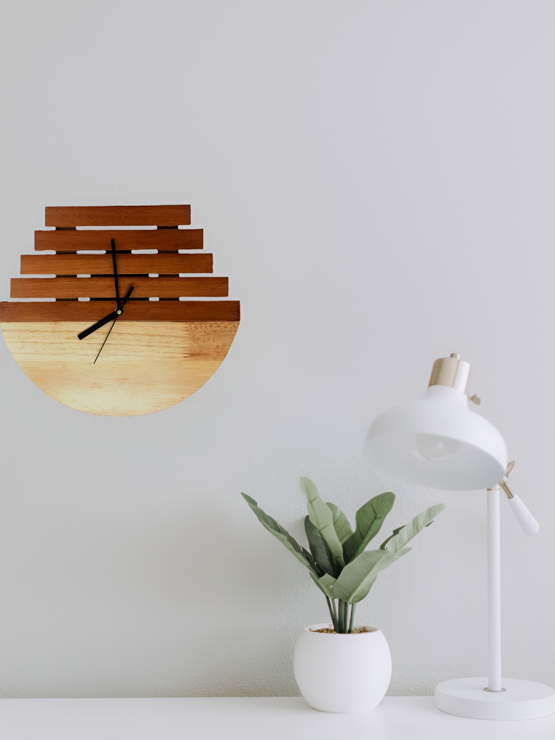 

Crimson Knot Brown & Beige Oval Contemporary Wall Clock