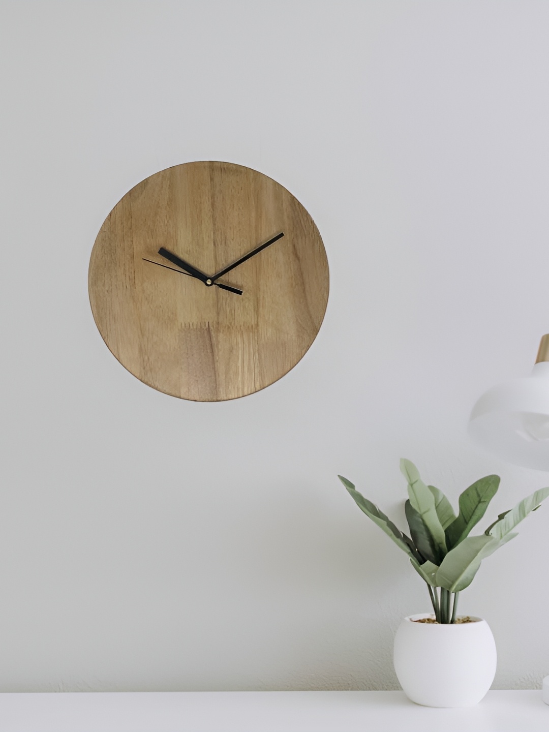 

Crimson Knot Brown & Black Round Contemporary Wall Clock