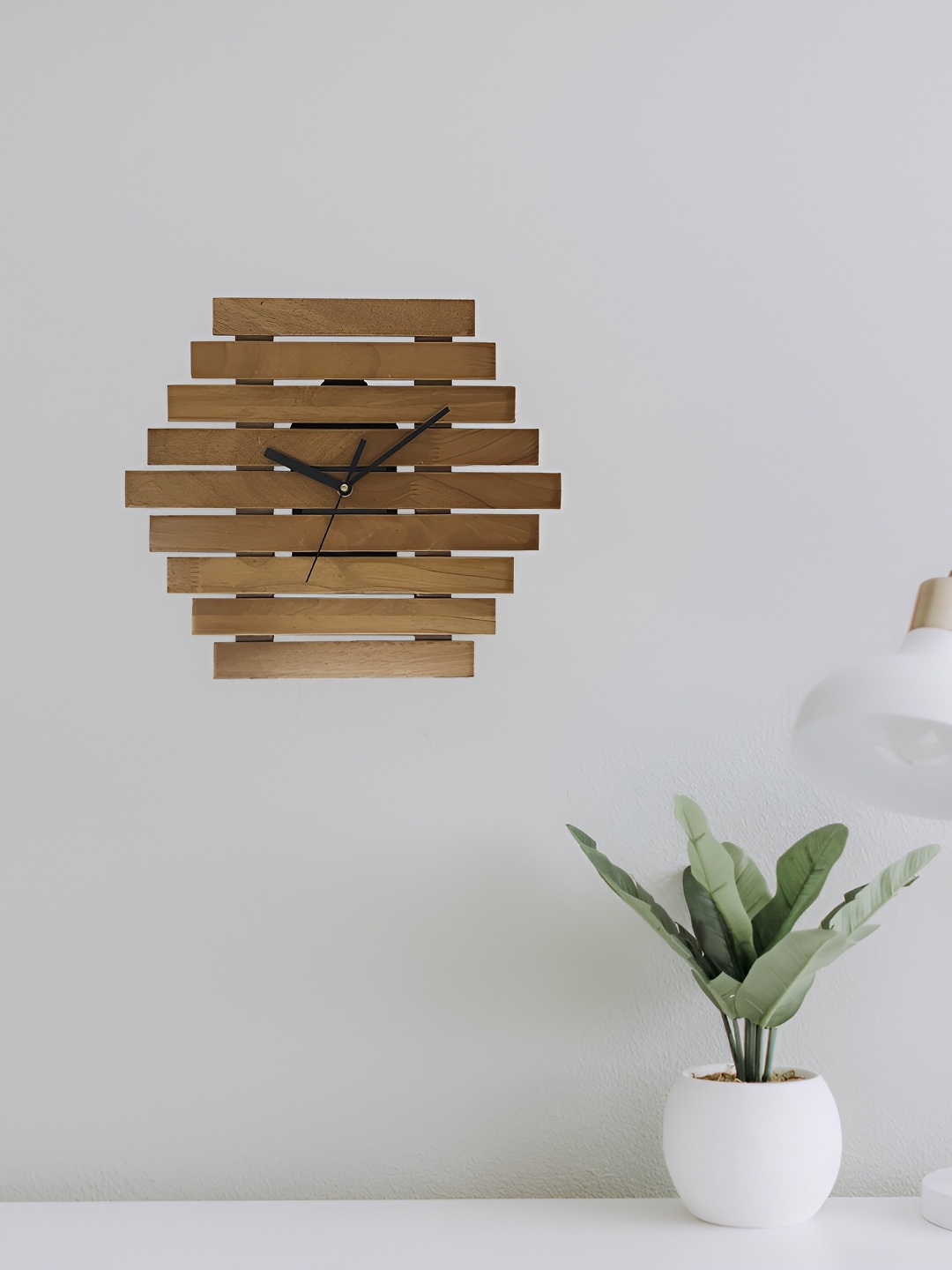 

Crimson Knot Brown & Black Geometric Contemporary Wall Clock