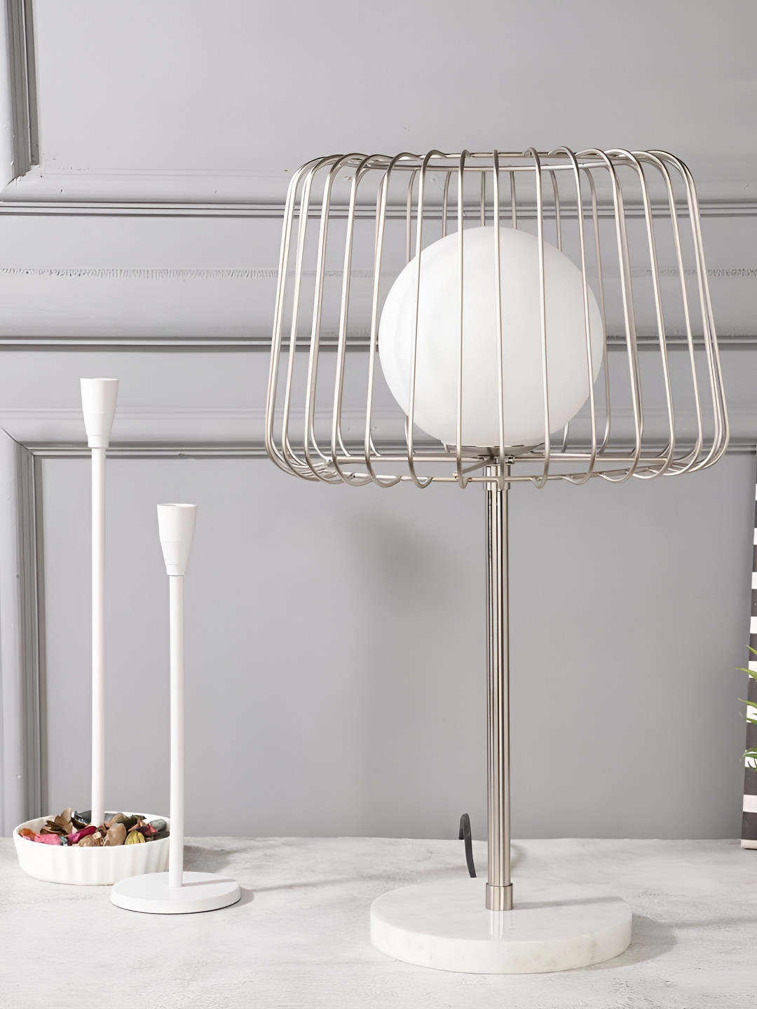

Decor de Maison Silver-Toned Aluminium Frustum Shaped Table Lamp