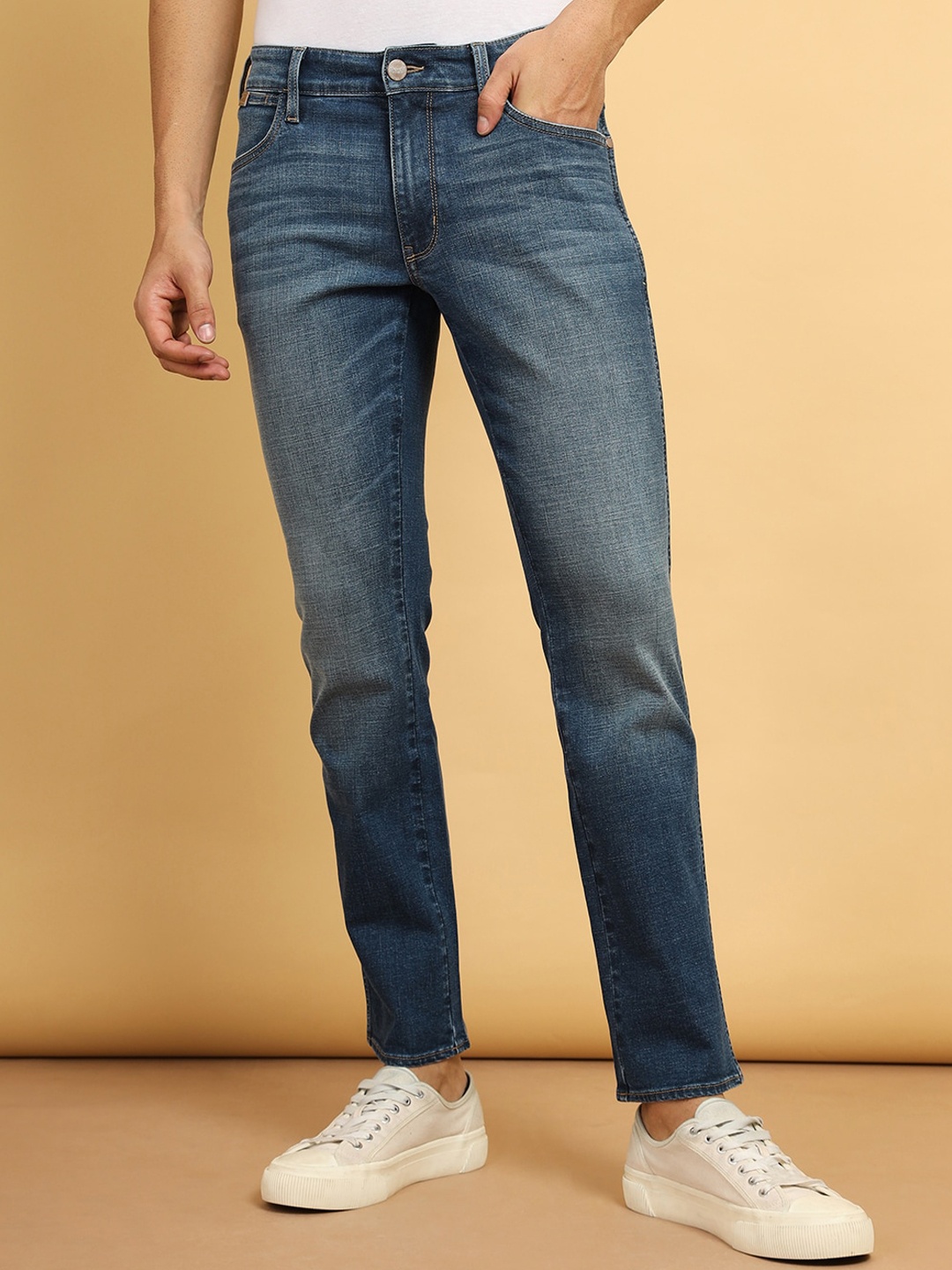 

Wrangler Men Millard Regular Fit Mid Rise Heavy Fade Stretchable Jeans, Blue