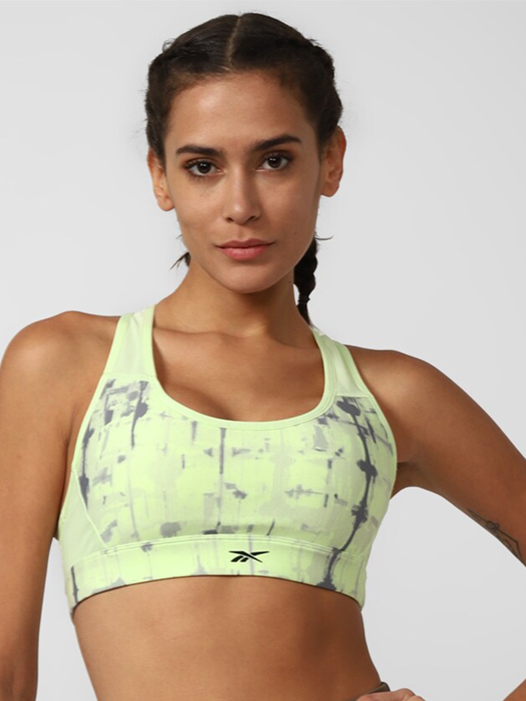 

Reebok Printed T-Strap Underwired Non Padded Lux Perform Racer Aop Workout Bra, Green