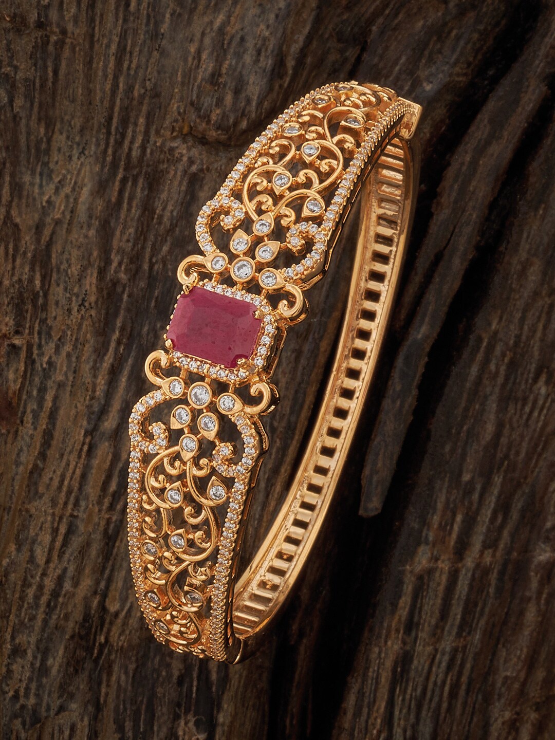 

Kushal's Fashion Jewellery Cubic Zirconia & Ruby Studded Gold Plated Bangle Style Bracelet