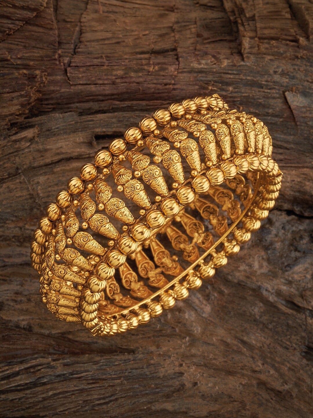 

Kushal's Fashion Jewellery Gold-Plated Ethnic Antique Bangle