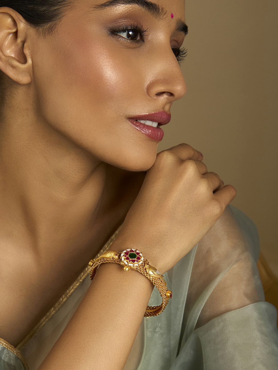 

Kushal's Fashion Jewellery Gold-Plated Stone-Studded Beaded Kada Bracelet