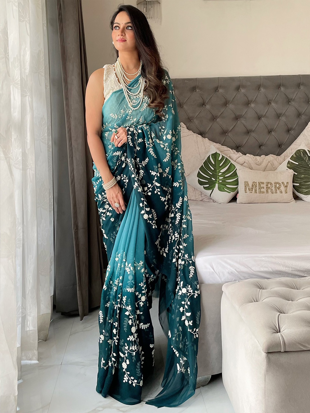 

Anouk Teal & White Floral Embroidered Saree