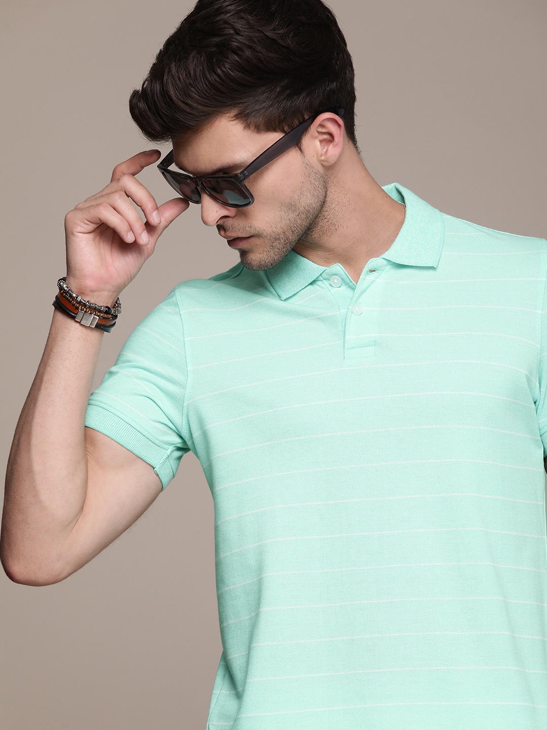 

Roadster Men Striped Polo Collar T-shirt, Sea green