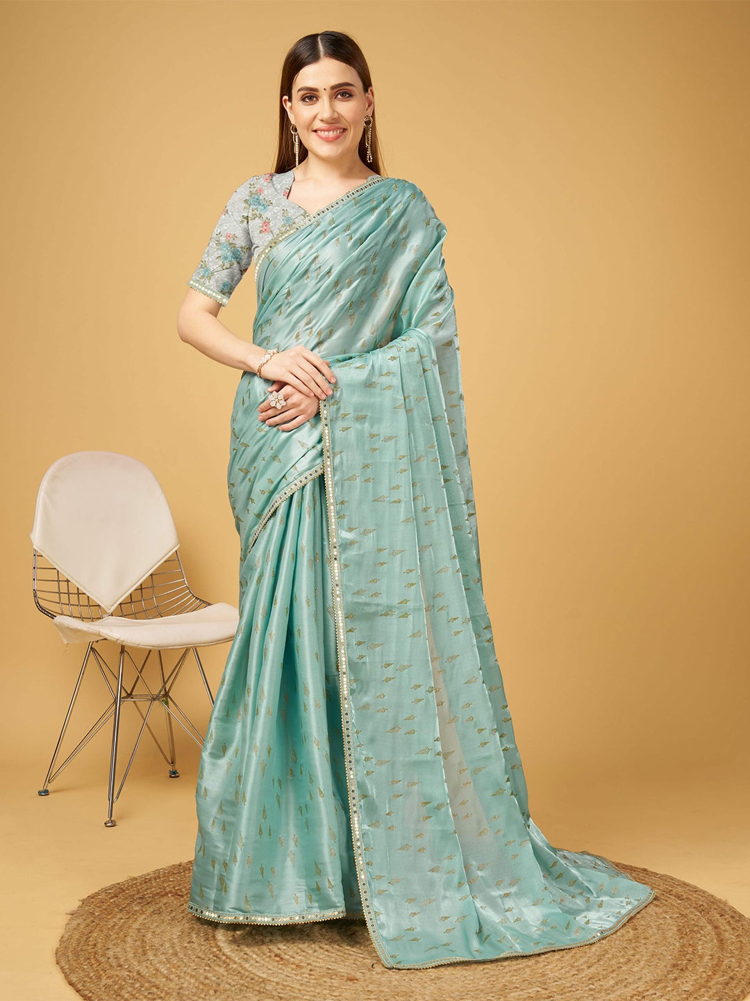 

Mitera Teal Embellished Pure Crepe Saree